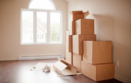 Packed office furniture and equipment ready for transport in Roehampton
