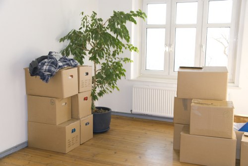 Roehampton residential street with a removals van and moving boxes