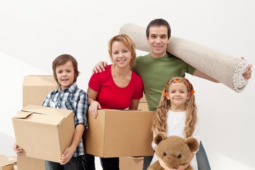 Moving team loading furniture with care for a Roehampton relocation