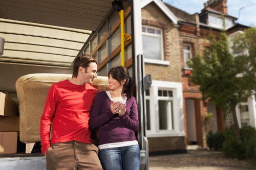 Professional movers planning access and parking for a Roehampton property